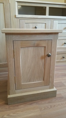 Oak bedside cabinet.
